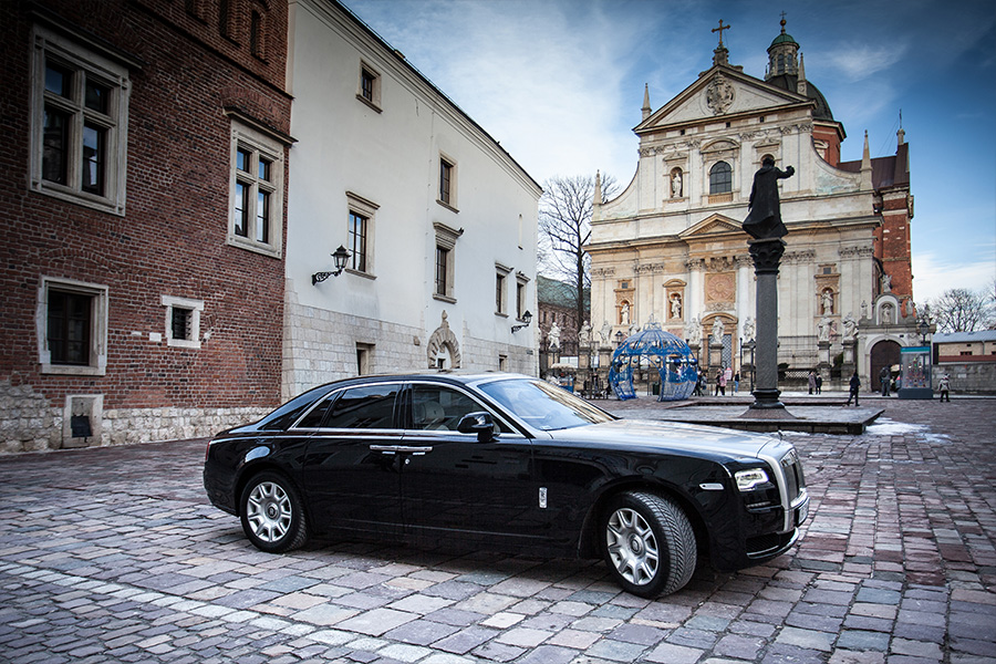 Rolls-Royce at Kanonicza Street Cracow Poland church of Saints Peter and Paul in the background